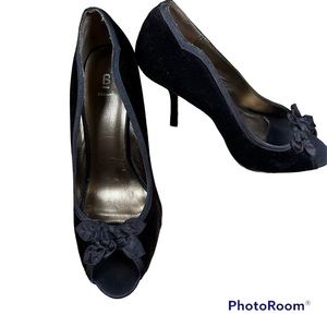 Brown faux velvet open toe pump.